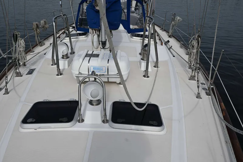 Slide: The Image of Deck view of 1989 Ta Shing Yachts Taswell 43 sailboat, featuring rigging and hatches. - 20