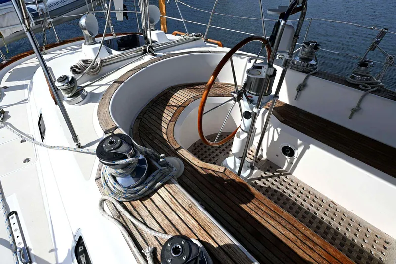 Slide: The Image of Cockpit of 1989 Ta Shing Yachts Taswell 43 sailboat with wooden wheel and winches. - 27