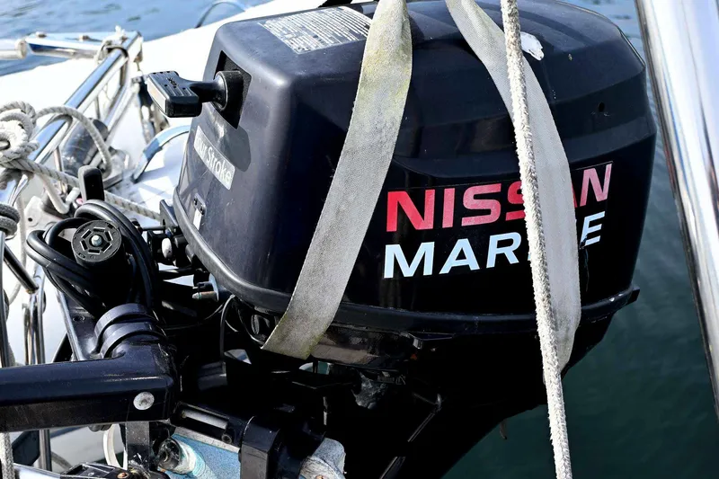 Slide: The Image of Nissan Marine outboard motor on 1989 Ta Shing Yachts Taswell 43 sailboat. - 35
