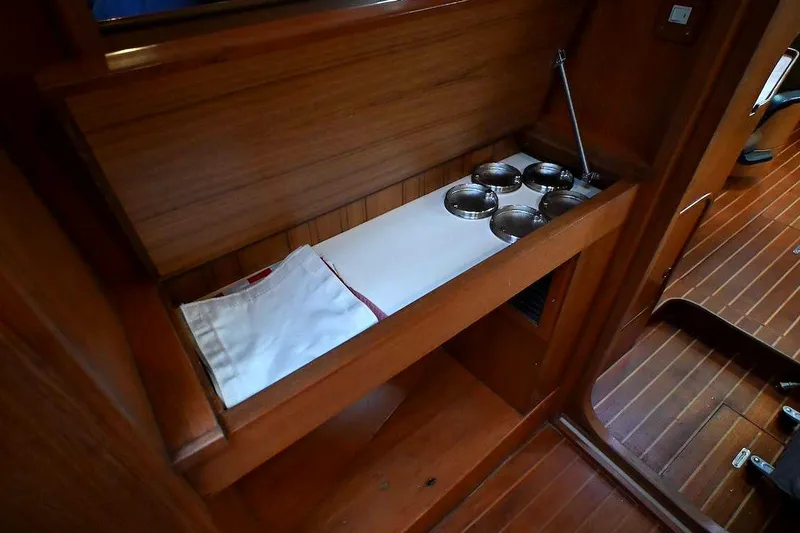 Slide: The Image of Interior of 1989 Ta Shing Yachts Taswell 43 with wooden cabinetry and storage space. - 69