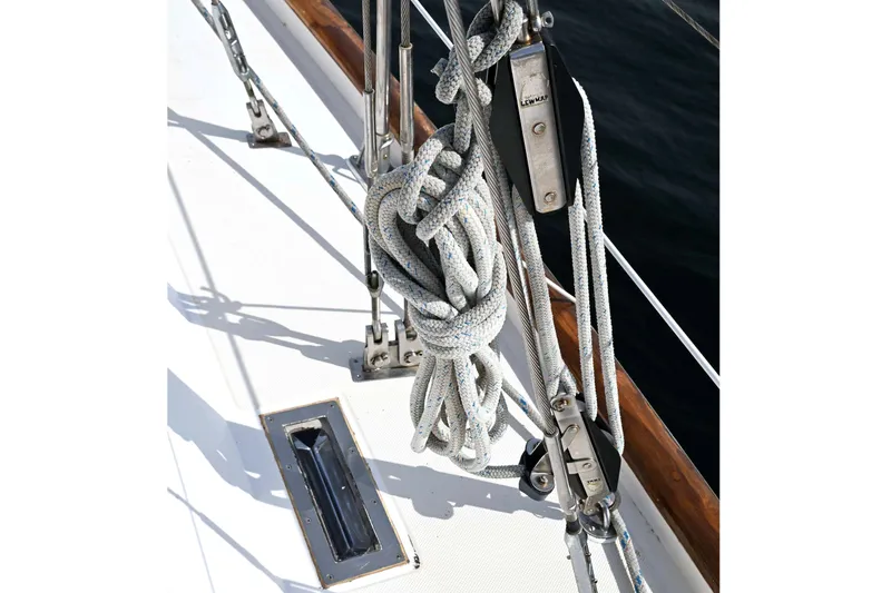 Slide: The Image of Deck of 1989 Ta Shing Yachts Taswell 43 with coiled ropes and hardware. - 30