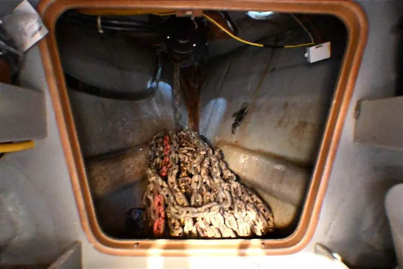 Slide: The Image of Anchor chain storage inside 1989 Ta Shing Yachts Taswell 43 sailboat. - 74