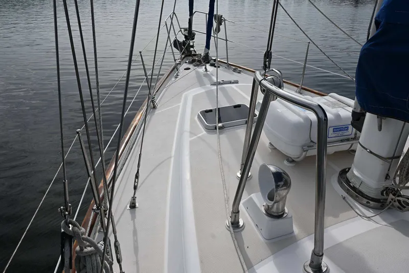 Slide: The Image of Deck view of 1989 Ta Shing Yachts Taswell 43 sailboat, showcasing rigging and fittings. - 16