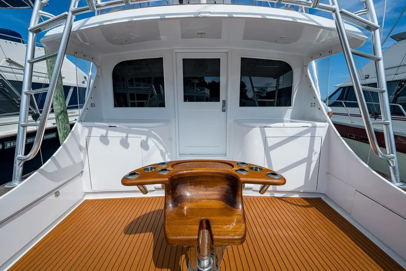 Slide: The Image of 1986 Buddy Davis 47 Convertible yacht cockpit with teak flooring and fishing station. - 7