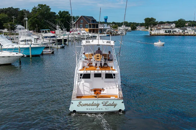 Slide: The Image of 1986 Buddy Davis 47 Convertible yacht cruising in a marina, Waretown, NJ. - 58