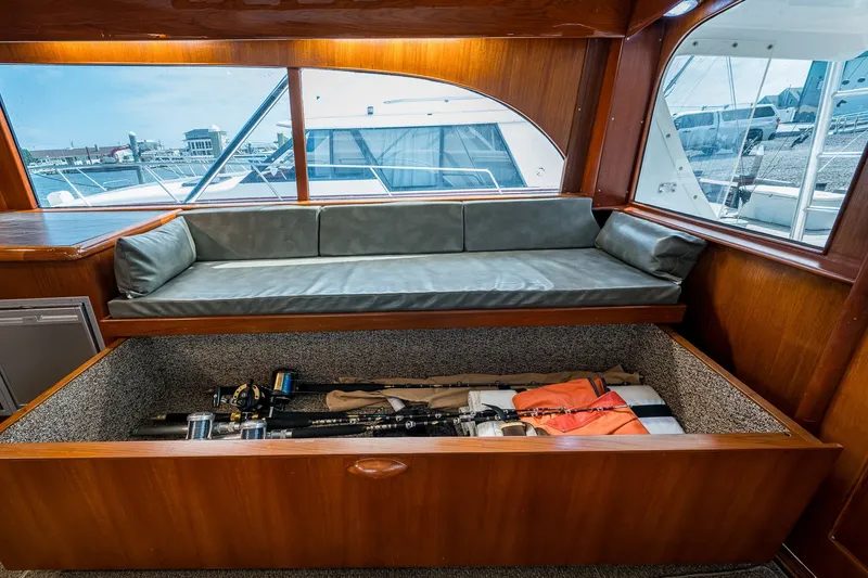 Slide: The Image of Interior of 1986 Buddy Davis 47 Convertible yacht with storage under seating. - 78