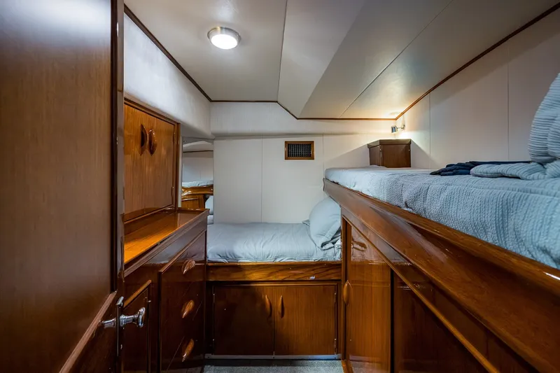 Slide: The Image of Cozy cabin interior of 1986 Buddy Davis 47 Convertible yacht with wooden furnishings. - 40