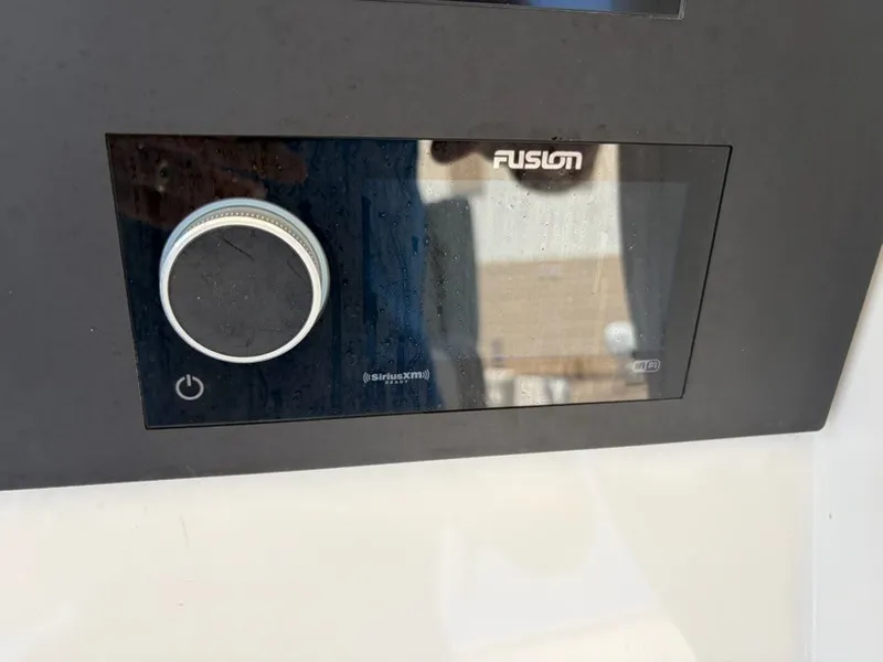Slide: The Image of Close-up of a Fusion audio system on a 2022 Regulator 31 boat. - 14