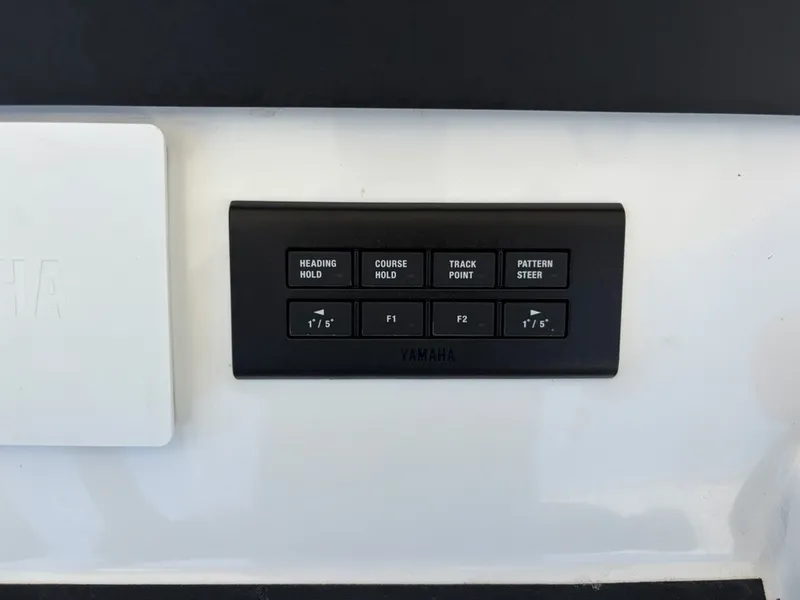 Slide: The Image of Yamaha control panel with buttons for heading and pattern steering. - 12