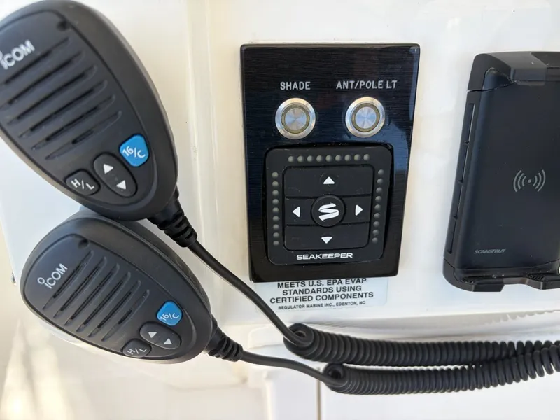 Slide: The Image of Control panel and microphones on a boat. - 10