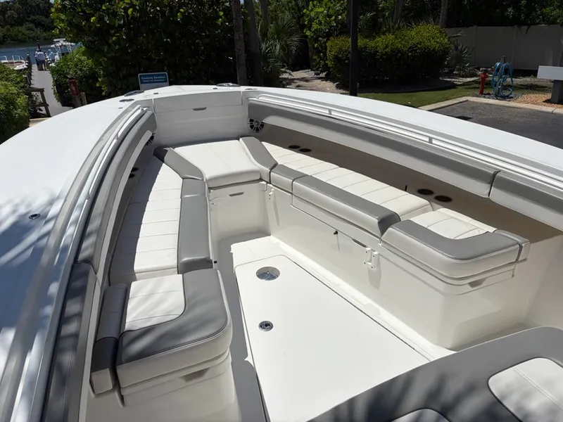 Slide: The Image of 2022 Regulator 31 with spacious cushioned bow seating area, perfect for relaxing. - 17