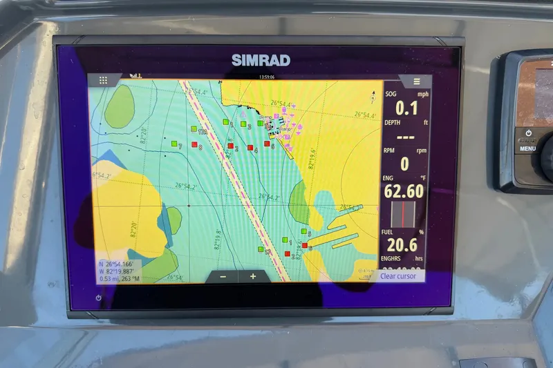Slide: The Image of Simrad navigation display on Parker Poland 690 Sport, 2021 model, showing nautical chart and data. - 11