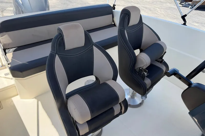 Slide: The Image of 2021 Parker Poland 690 Sport boat interior with stylish seating and modern design. - 9