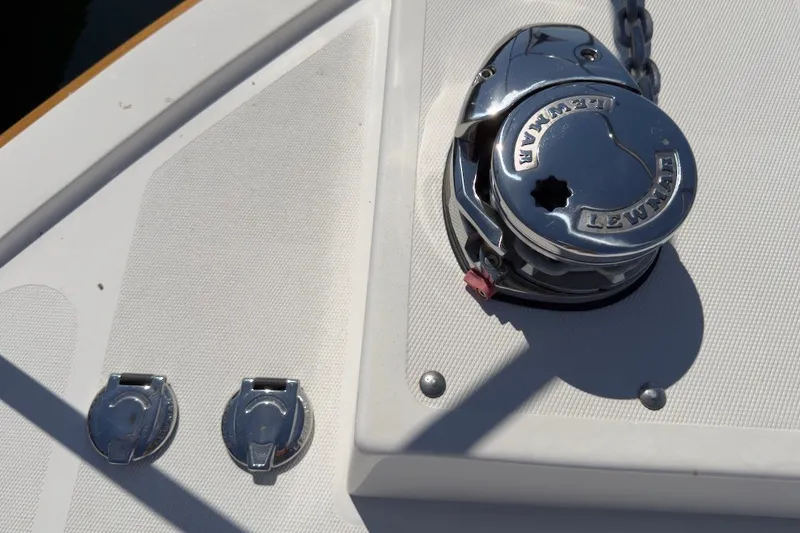 Slide: The Image of Chrome winch and fittings on 2023 Fortier 33 boat deck. - 76