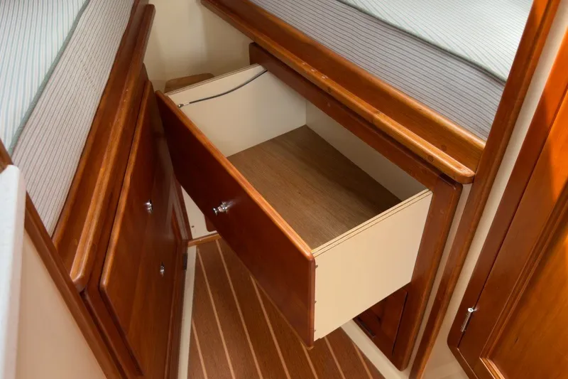 Slide: The Image of Wooden interior drawer in 2023 Fortier 33 boat cabin, showcasing storage space. - 50