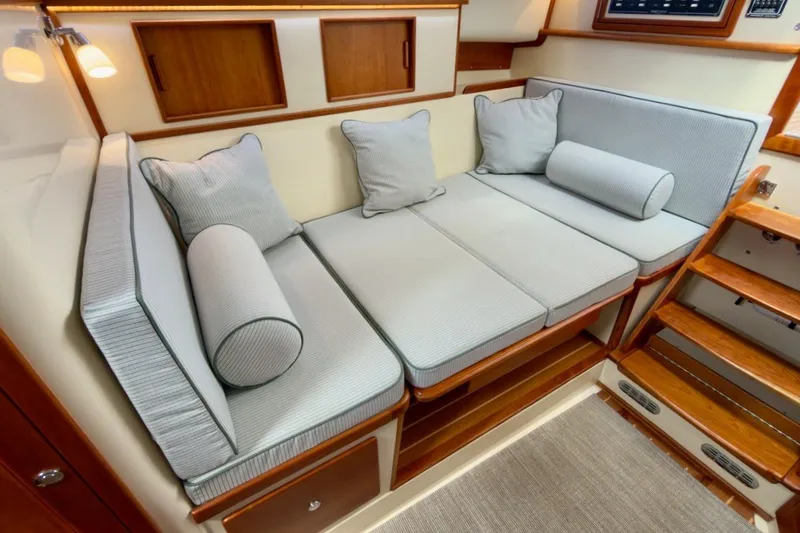 Slide: The Image of Luxurious interior of 2023 Fortier 33 boat with comfortable seating and wooden accents. - 42