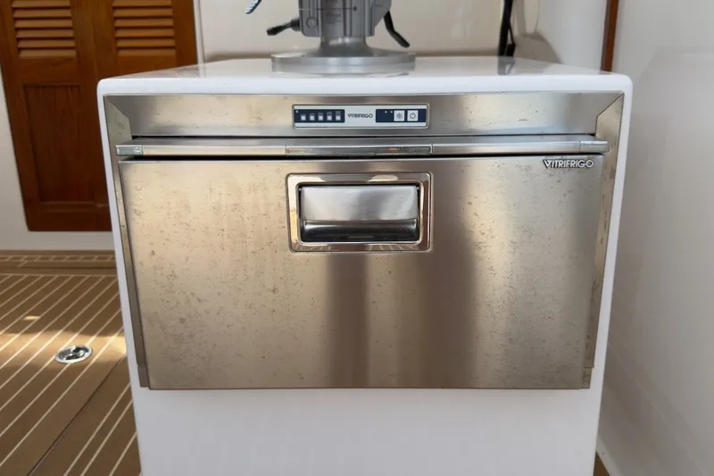 Slide: The Image of Stainless steel Vitrifrigo refrigerator on 2023 Fortier 33 boat interior. - 37