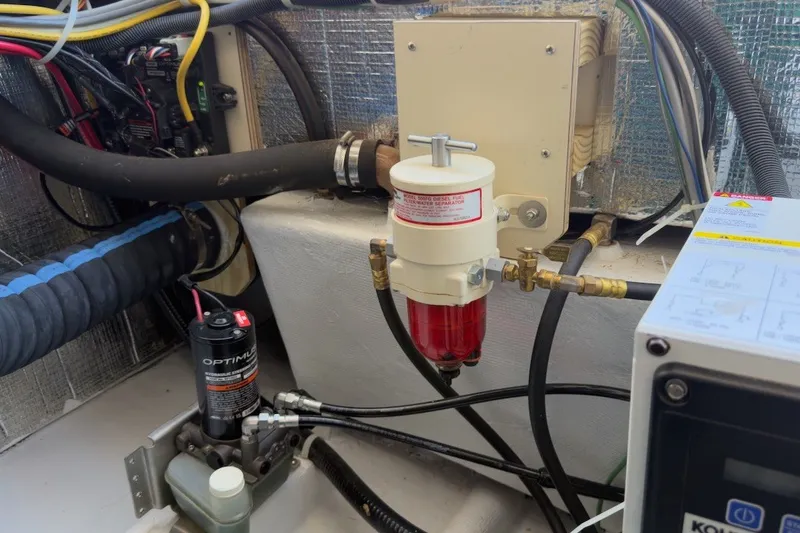 Slide: The Image of Engine compartment of 2023 Fortier 33 with fuel filter and wiring. - 72