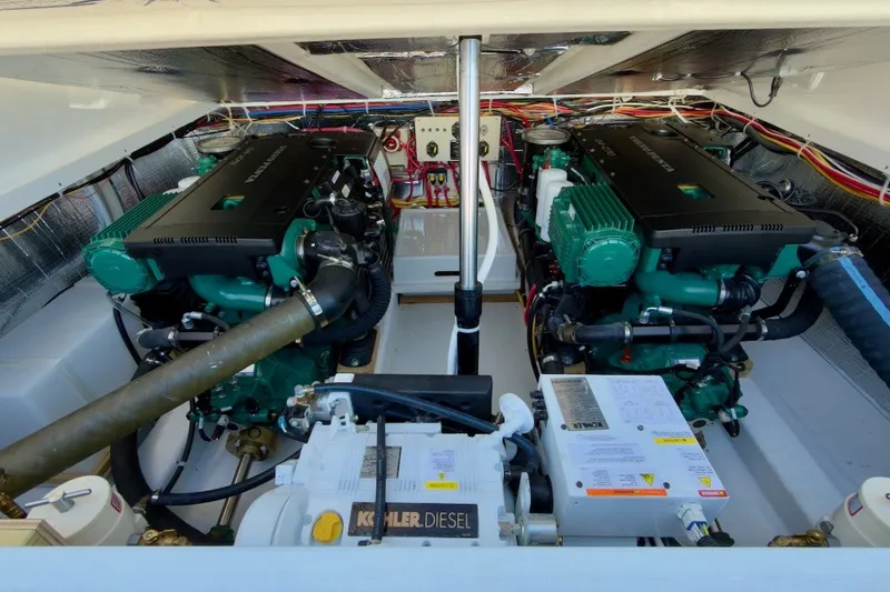 Slide: The Image of Engine room of 2023 Fortier 33 boat with dual diesel engines and Kohler generator. - 65
