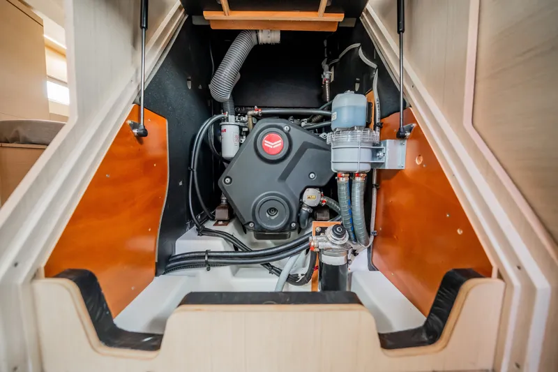 Slide: The Image of Engine compartment of a 2020 Beneteau Oceanis 46.1 sailboat, showcasing mechanical components. - 40