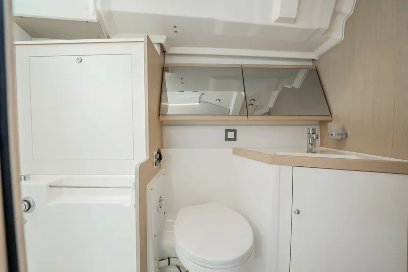 Slide: The Image of Modern bathroom interior of 2020 Beneteau Oceanis 46.1 yacht, featuring sleek design and fixtures. - 36