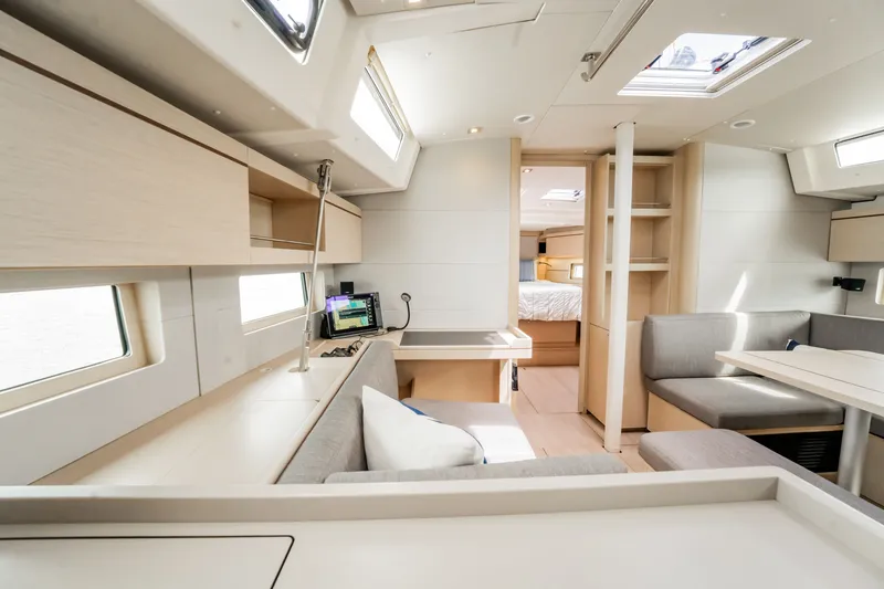 Slide: The Image of Modern interior of 2020 Beneteau Oceanis 46.1 yacht, featuring sleek design and comfortable seating. - 18