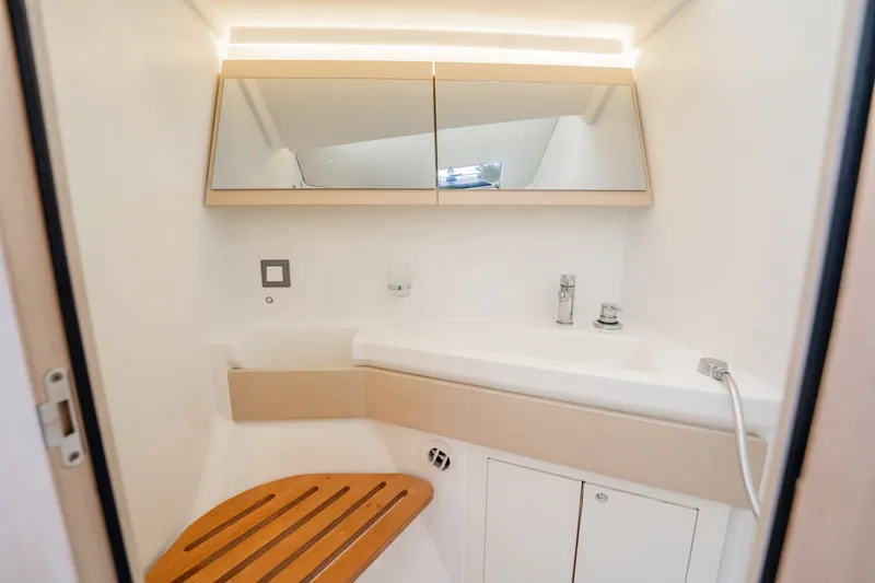 Slide: The Image of Modern bathroom interior on 2020 Beneteau Oceanis 46.1 yacht, featuring sleek design and fixtures. - 37