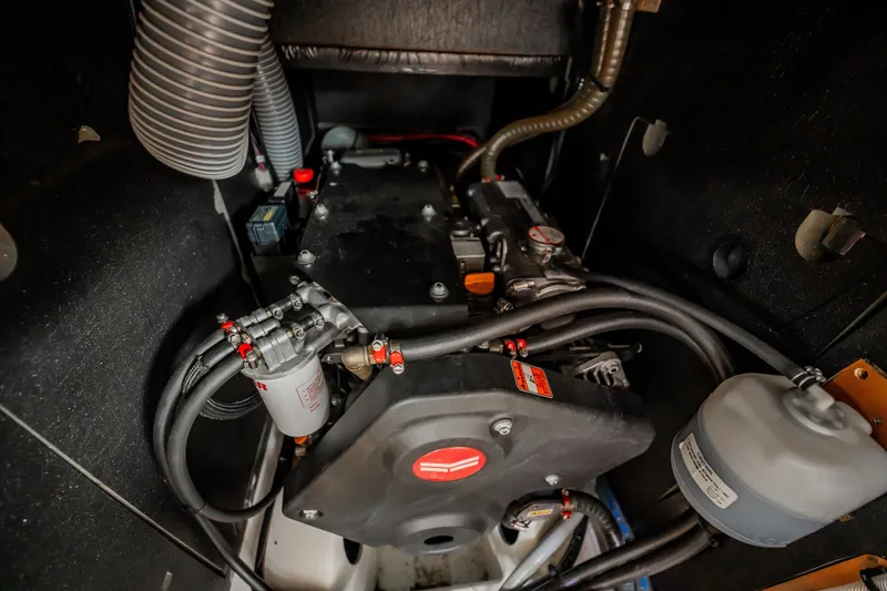 Slide: The Image of Engine compartment of a 2020 Beneteau Oceanis 46.1 sailboat, showcasing mechanical components. - 41