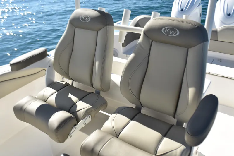 Slide: The Image of 2024 Key West 263 FS boat seats with ocean backdrop. - 19