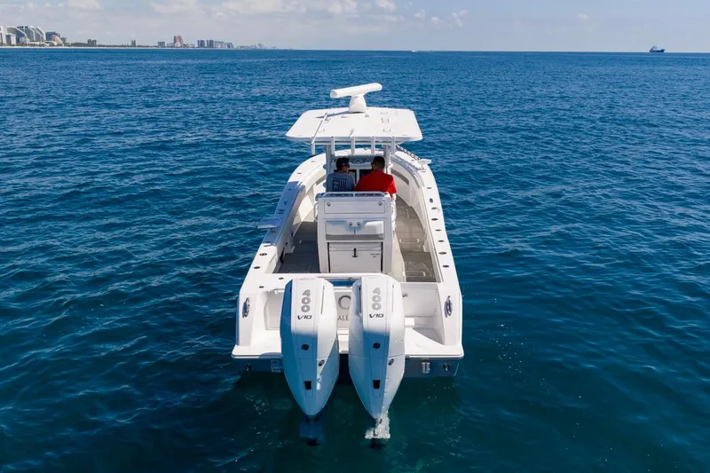 Slide: The Image of 2025 Invincible 33 Open Fisherman boat cruising on open ocean waters. - 57