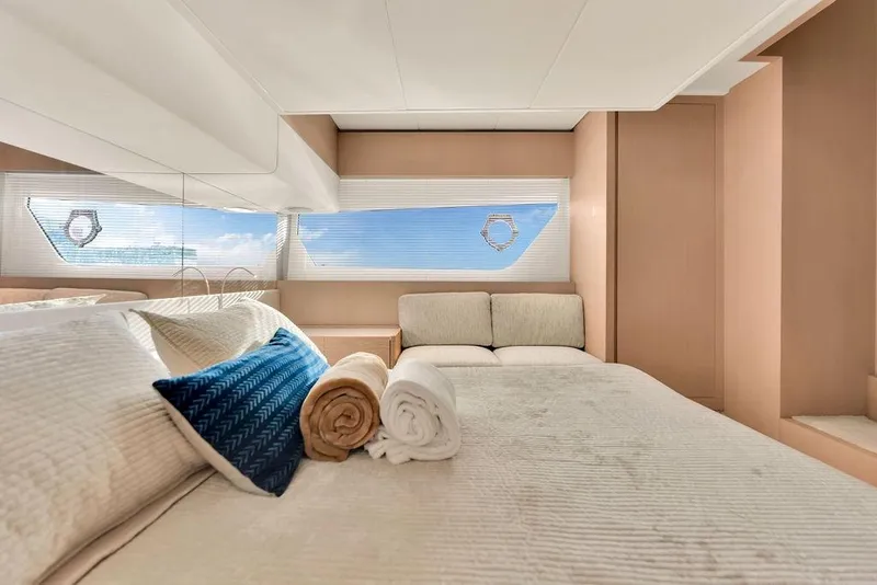 Slide: The Image of Luxurious bedroom interior of 2021 Ferretti Yachts 500, featuring elegant bedding and panoramic windows. - 67