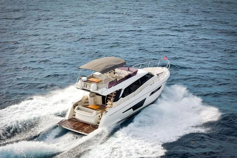 Slide: The Image of 2021 Ferretti Yachts 500 cruising on open sea, showcasing luxury and elegance. - 17