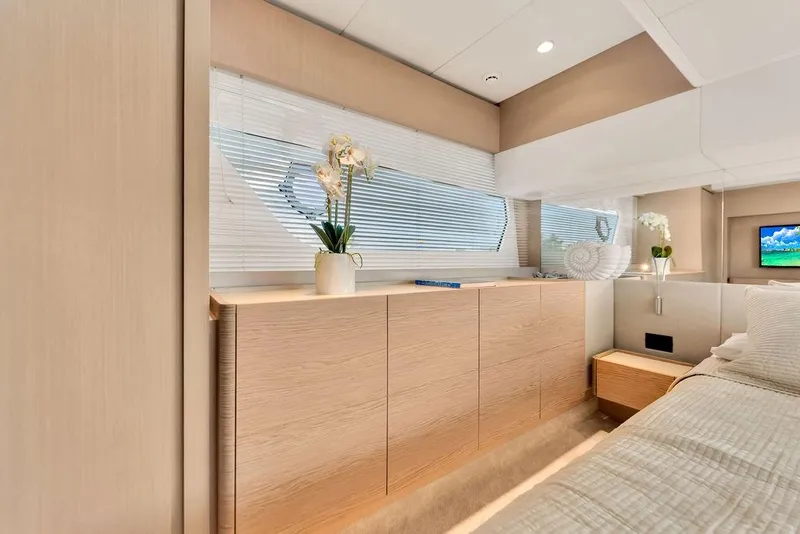 Slide: The Image of Luxurious interior of 2021 Ferretti Yachts 500, featuring elegant wood cabinetry and modern decor. - 66
