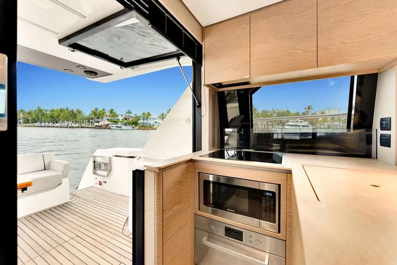 Slide: The Image of Modern kitchen interior on 2021 Ferretti Yachts 500 with waterfront view. - 42