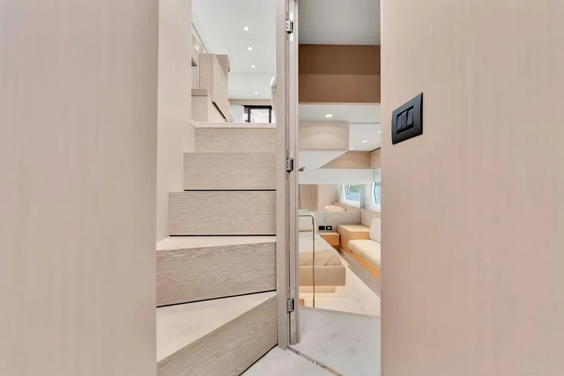 Slide: The Image of Interior view of 2021 Ferretti Yachts 500, featuring modern staircase and luxurious cabin. - 58