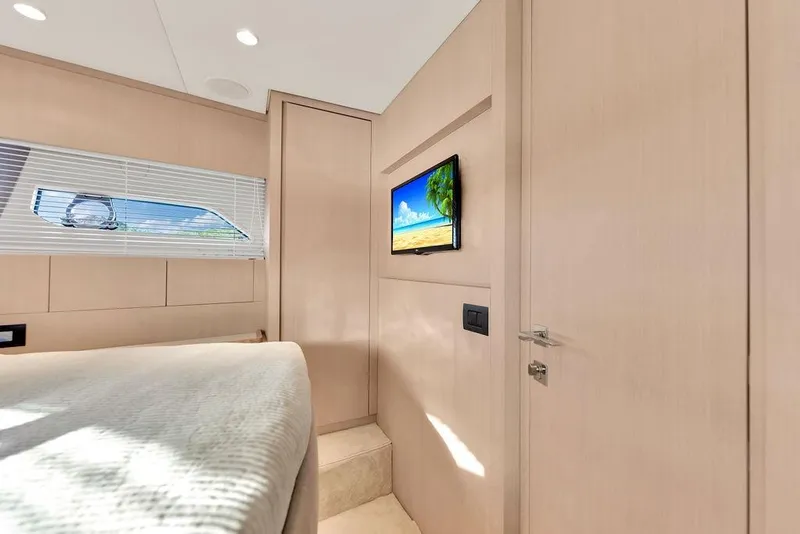 Slide: The Image of Luxurious interior of 2021 Ferretti Yachts 500 with modern design and wall-mounted TV. - 75