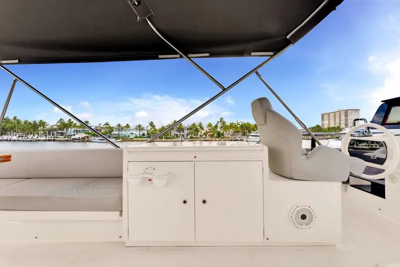 Slide: The Image of Luxurious 2021 Ferretti Yachts 500 helm with scenic marina view. - 32