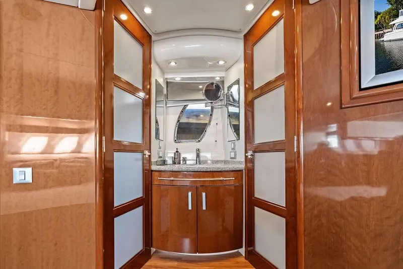 Slide: The Image of Luxurious bathroom interior of 2009 Carver 56 Voyager SE yacht with wood finishes. - 28