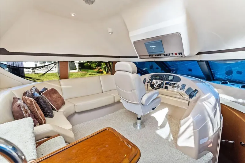 Slide: The Image of Luxurious interior of 2009 Carver 56 Voyager SE yacht with helm and seating area. - 20