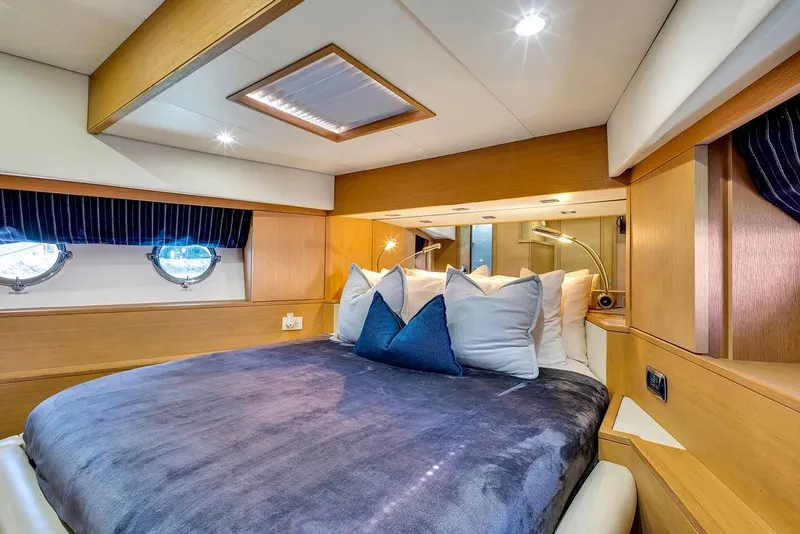 Slide: The Image of Luxurious bedroom interior of 2008 Aicon 75 yacht with plush bedding and elegant lighting. - 85