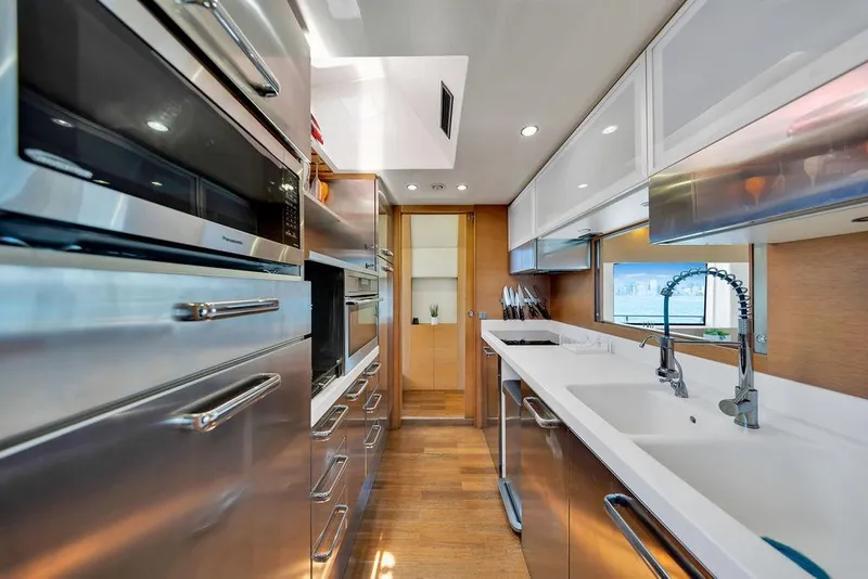 Slide: The Image of Luxurious modern kitchen interior on 2008 Aicon 75 yacht, featuring stainless steel appliances and sleek design. - 63