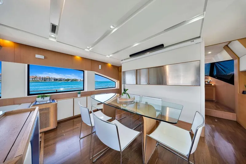 Slide: The Image of Luxurious interior of 2008 Aicon 75 yacht with modern dining area and scenic ocean view. - 61