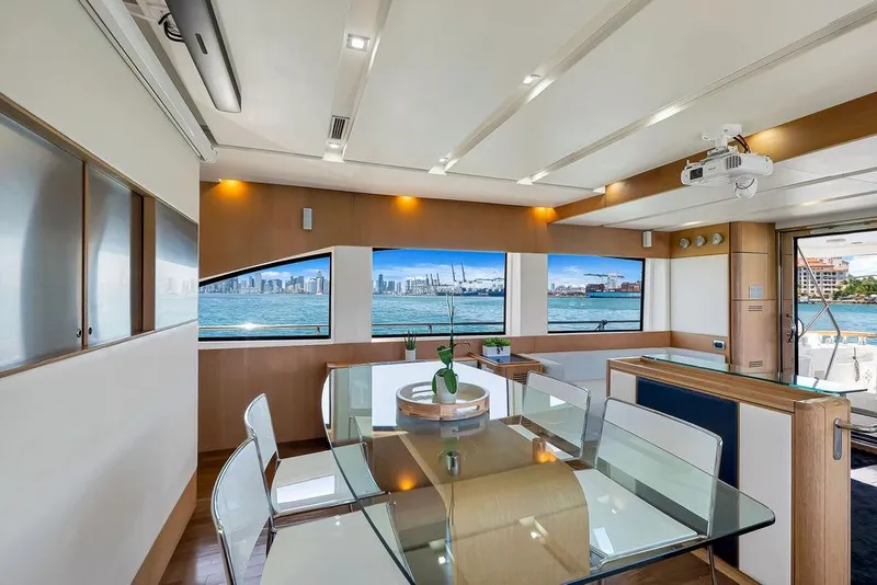Slide: The Image of Luxurious interior of 2008 Aicon 75 yacht with panoramic ocean views and elegant dining area. - 56