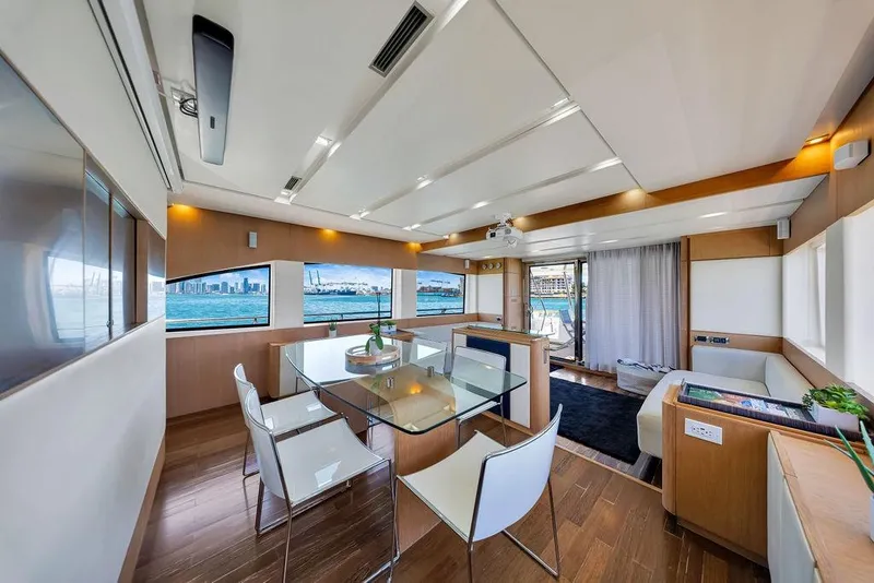 Slide: The Image of Luxurious interior of 2008 Aicon 75 yacht with modern dining area and scenic ocean views. - 51