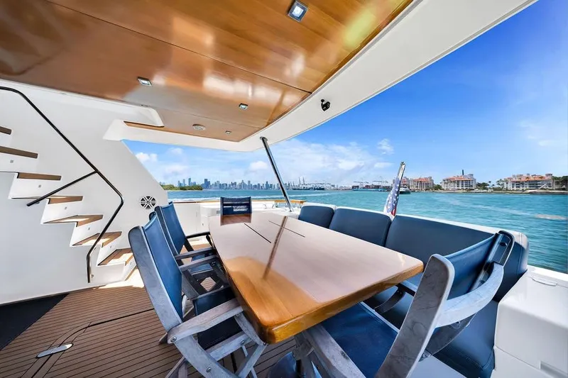 Slide: The Image of Luxurious 2008 Aicon 75 yacht deck with elegant seating and stunning waterfront views. - 19