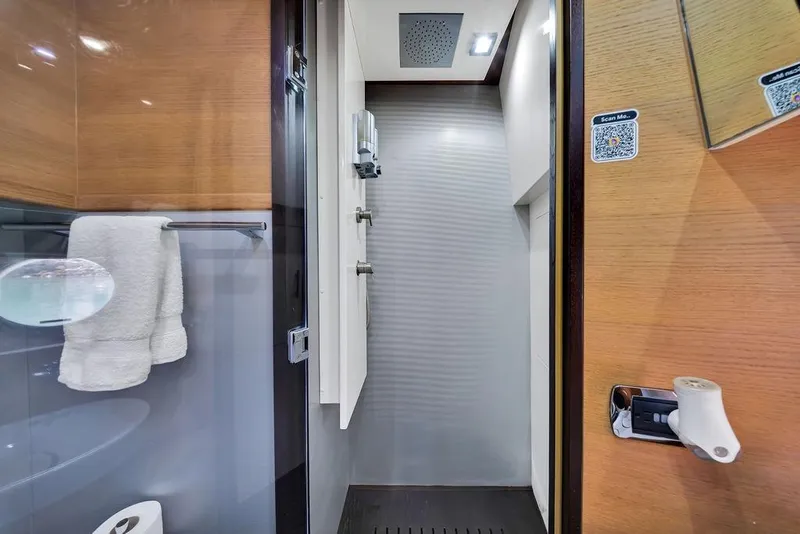 Slide: The Image of Luxurious bathroom interior of 2008 Aicon 75 yacht with modern fixtures and wooden accents. - 86