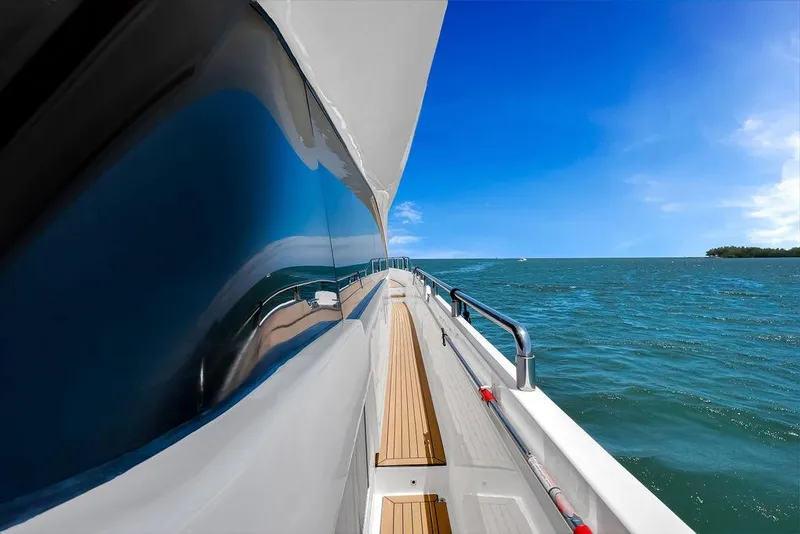 Slide: The Image of Side view of 2008 Aicon 75 yacht cruising on a sunny day. - 35