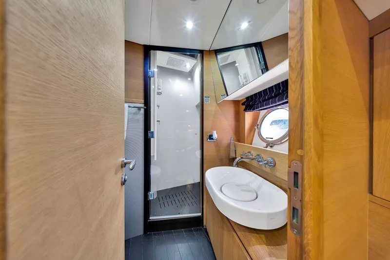 Slide: The Image of Luxurious bathroom interior of 2008 Aicon 75 yacht with modern fixtures and wooden accents. - 88