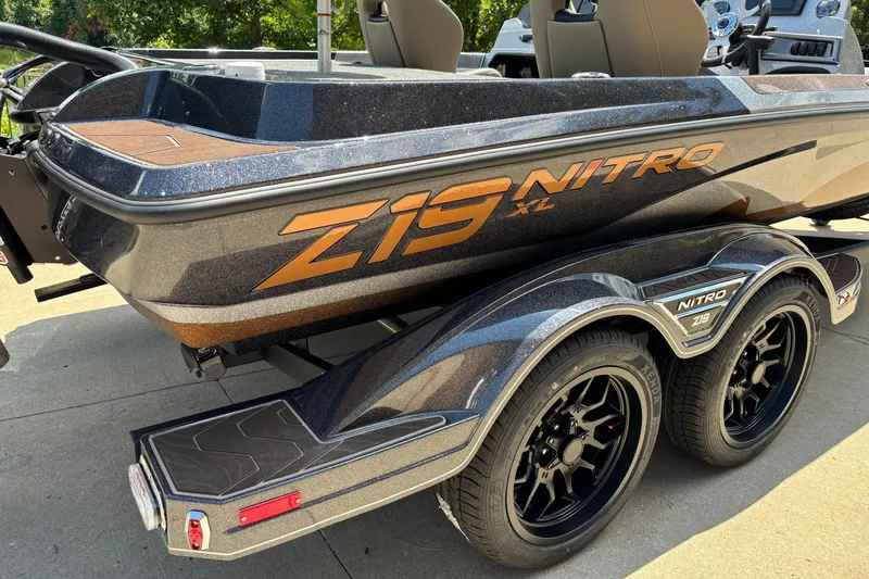 Slide: The Image of 2027 Nitro Z19 XL Pro boat on trailer, showcasing sleek design and branding. - 3