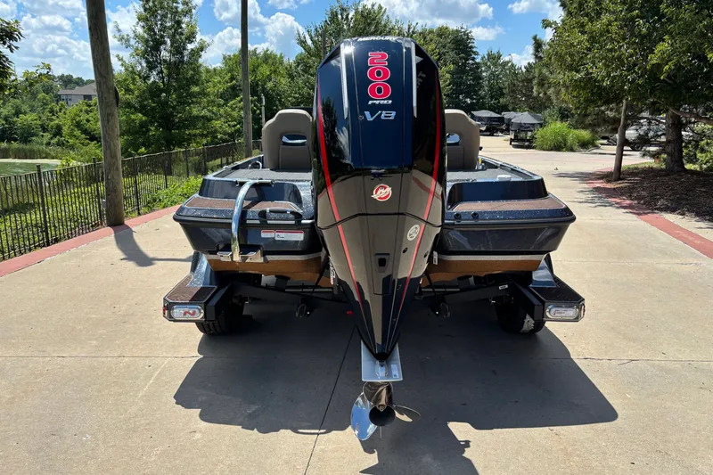 Slide: The Image of 2027 Nitro Z19 XL Pro boat with powerful V8 engine, parked outdoors. - 1